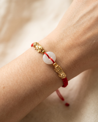 Double Pixiu Dragon with Jade Adjustable Red String Bracelet, detail view