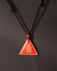 Amitabha Triangle cinnabar necklace on dark background