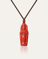 Guan Yin cinnabar necklace on ivory studio background