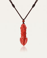 Guan Yin Phurba cinnabar necklace on ivory studio background