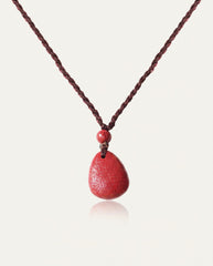 Heart Sutra Teardrop cinnabar necklace back on ivory studio background