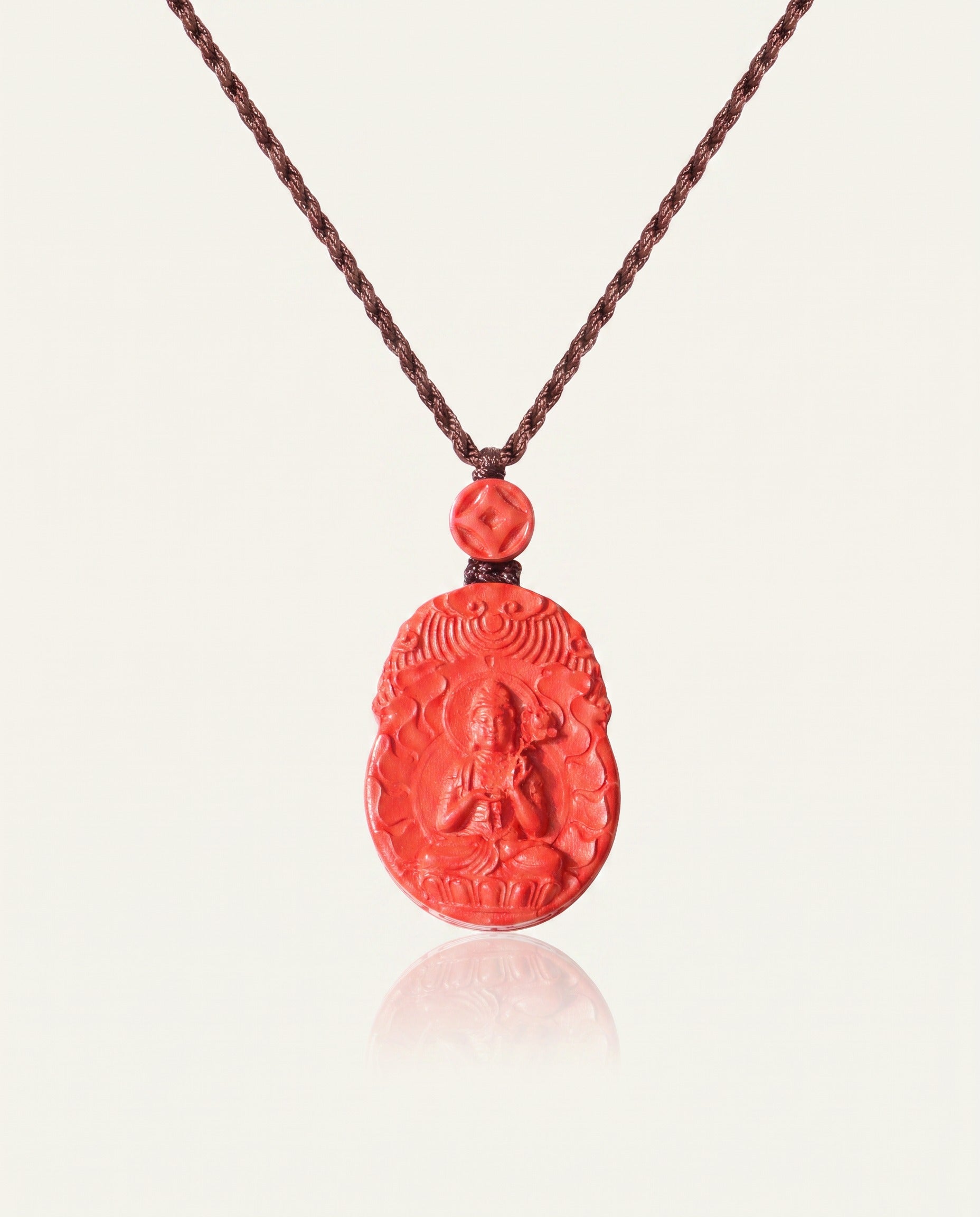 Horse Guardian cinnabar necklace on ivory studio background