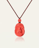 Horse Guardian cinnabar necklace on ivory studio background