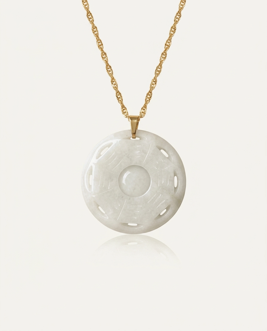 Jade Bagua Necklace on ivory background