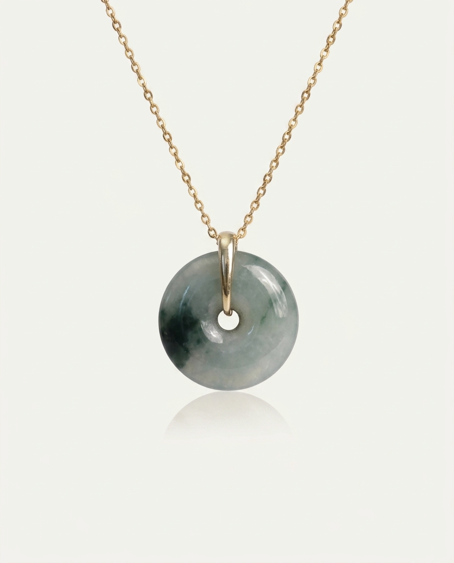 Jade Bi Disc Necklace on ivory background