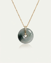 Jade Bi Disc Necklace on ivory background