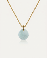 Jade Donut Necklace on ivory background