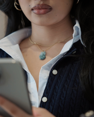 Jade fox necklace worn by model