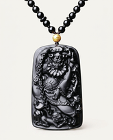 Zhong Kui obsidian pendant necklace on ivory studio background
