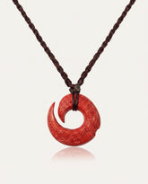 Protection Hook cinnabar necklace on ivory studio background