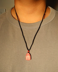 Wealth God cinnabar necklace worn