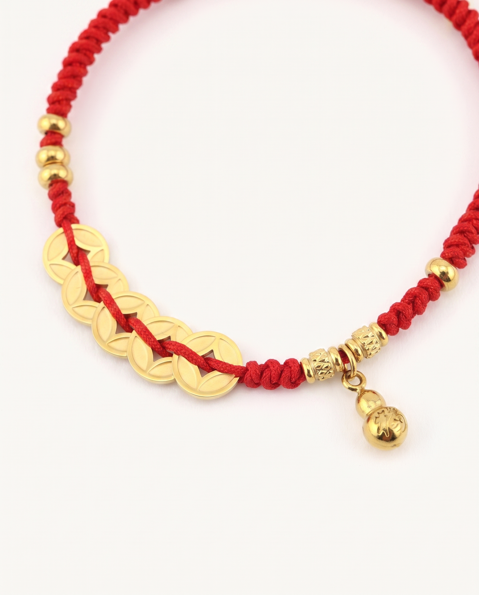 Five Emperors Coin with Hulu Red String Bracelet, close-up detail