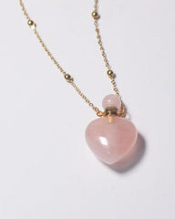Rose Quartz Crystal Potion Bottle Necklace with Gold Chain, side view