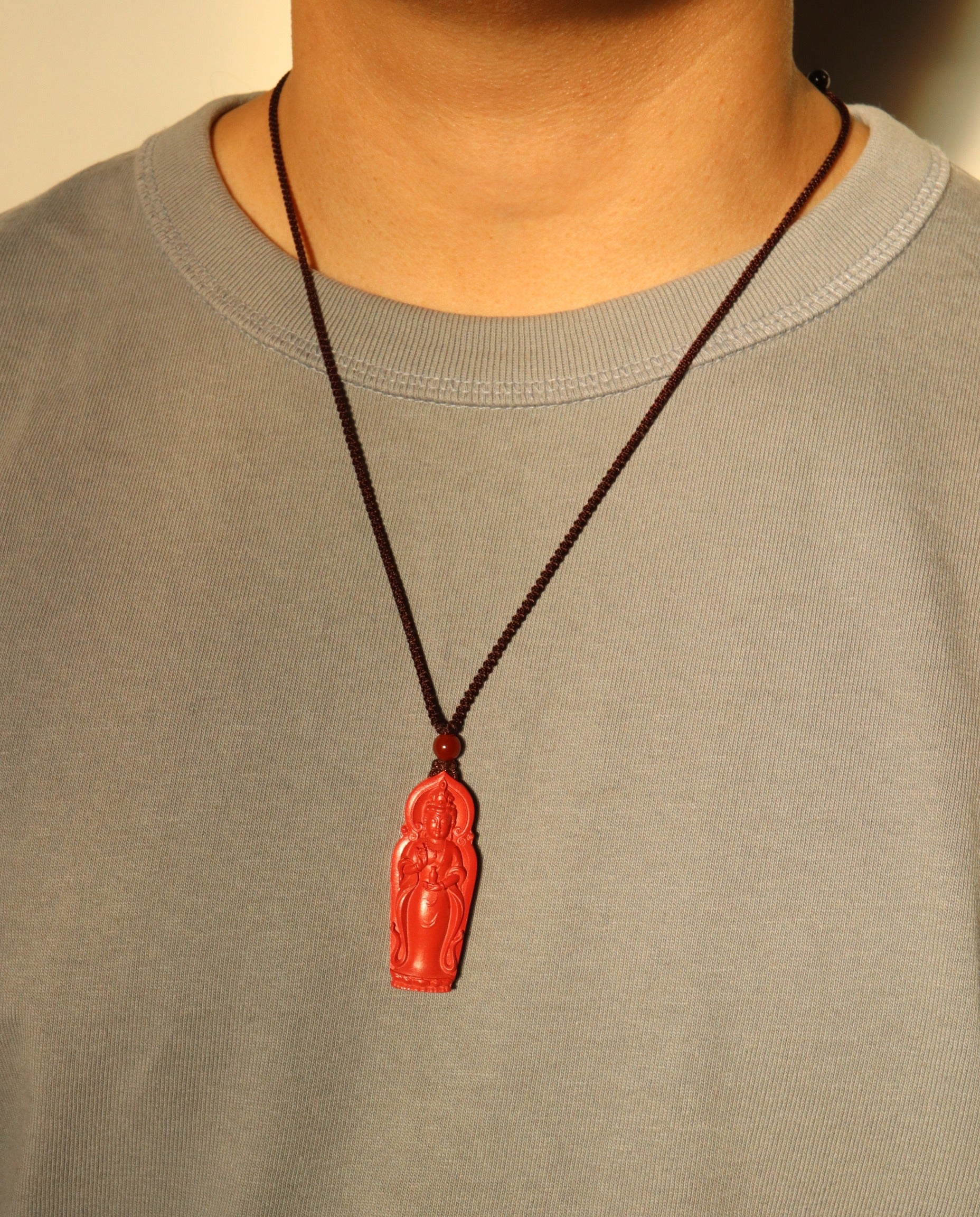 Guan Yin cinnabar necklace worn