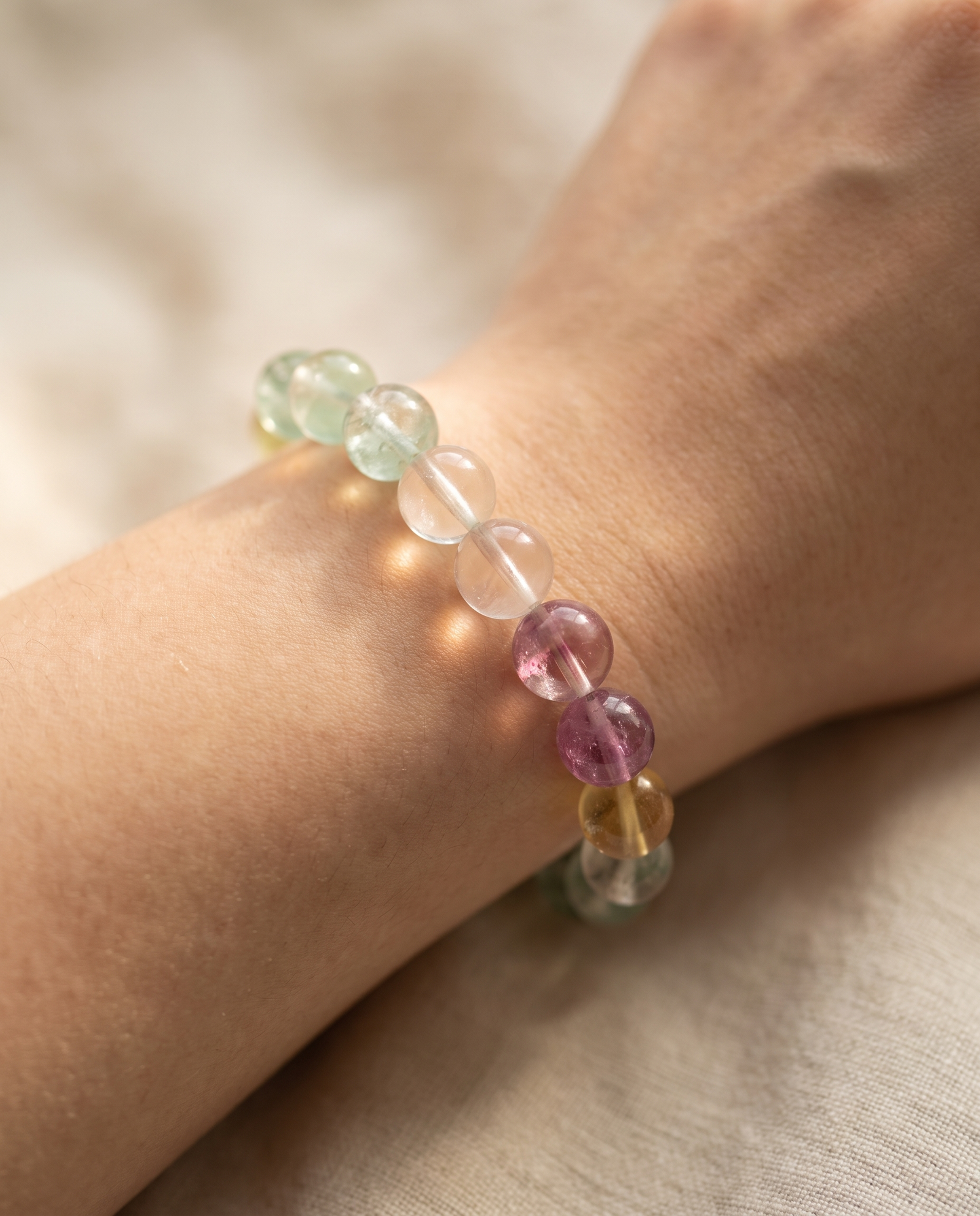 Rainbow Fluorite Bracelet worn on wrist