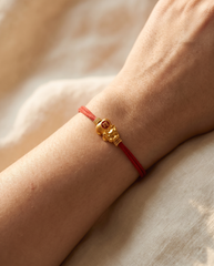 Baby Pixiu Dragon Red String Bracelet worn on wrist