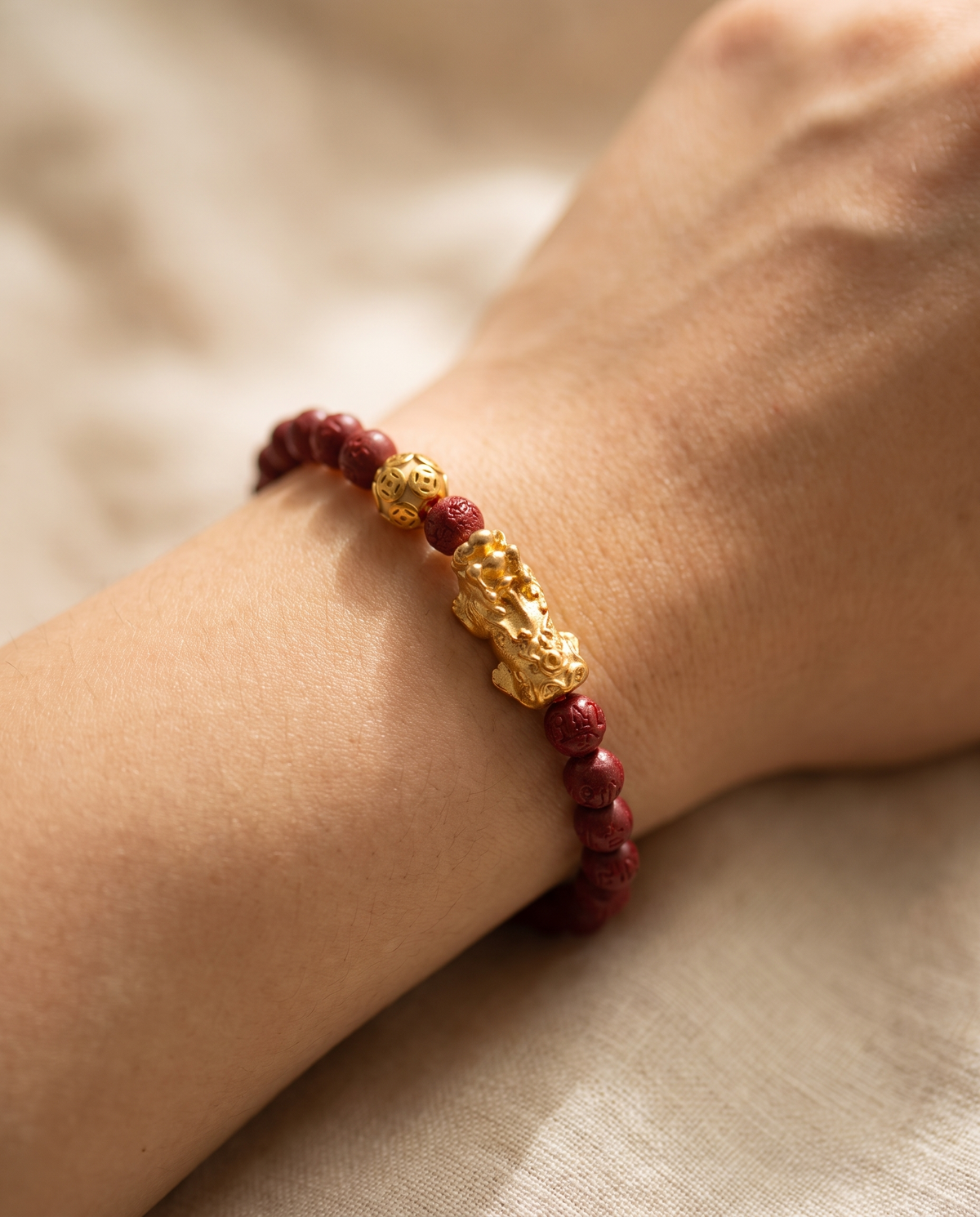 Prosperity Charm Mini Pixiu Dragon Red Cinnabar Bracelet worn on wrist