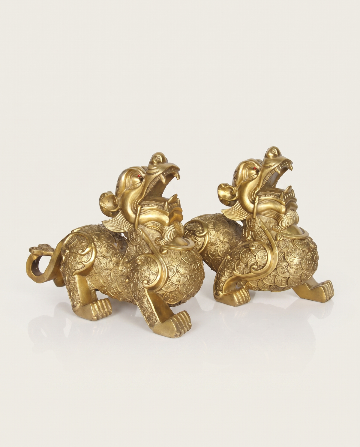 brass pixiu covered in coins pair