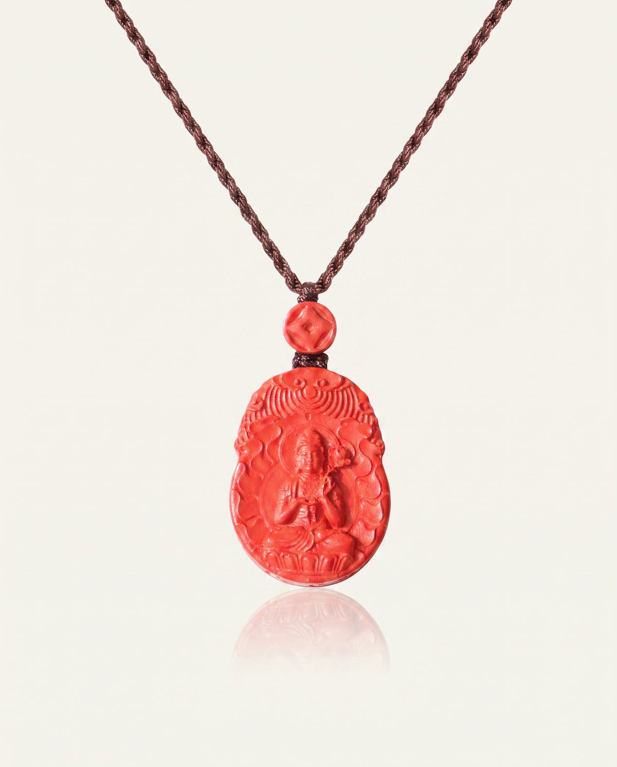 Horse Guardian cinnabar necklace on ivory studio background