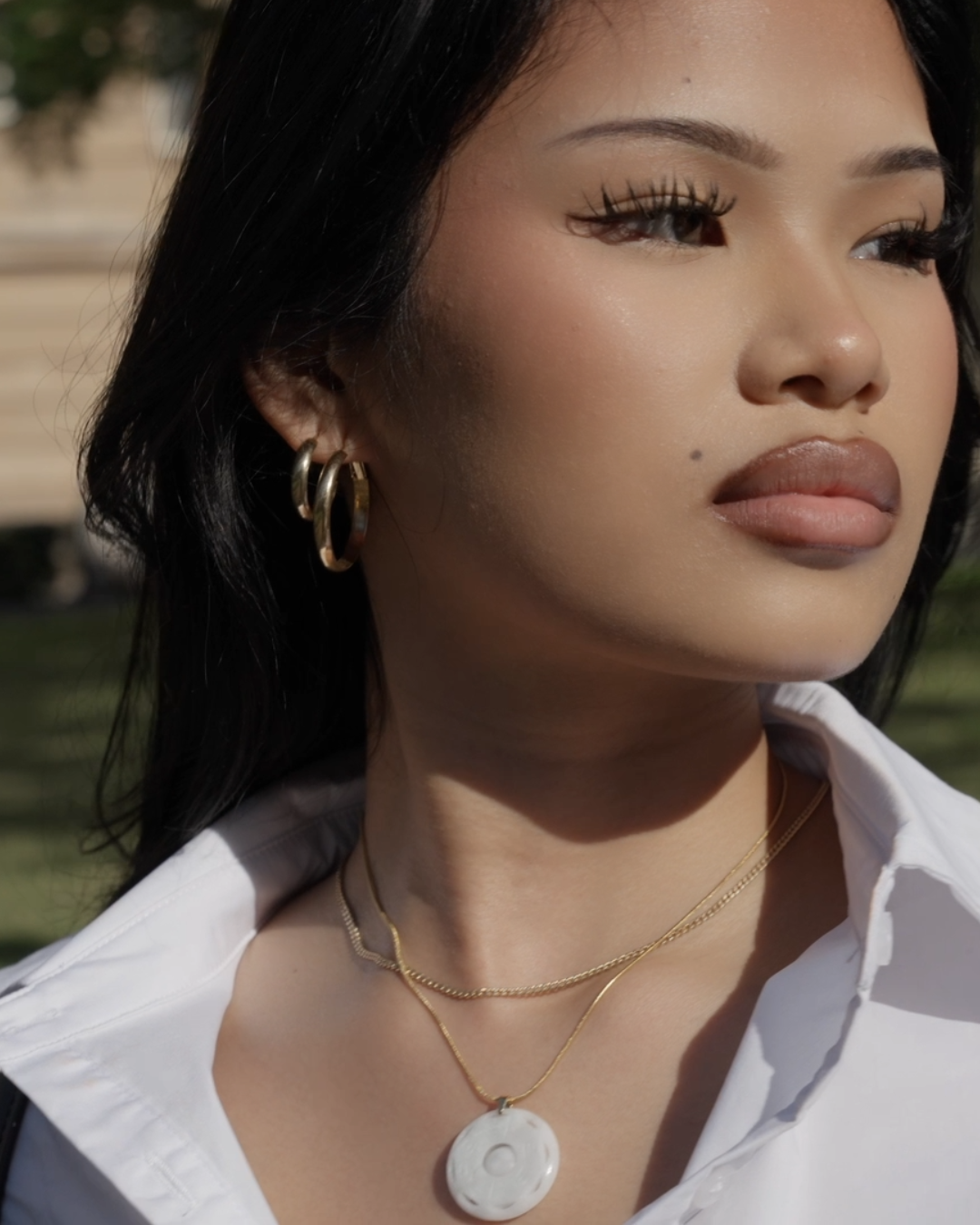 Jade bagua necklace worn by model