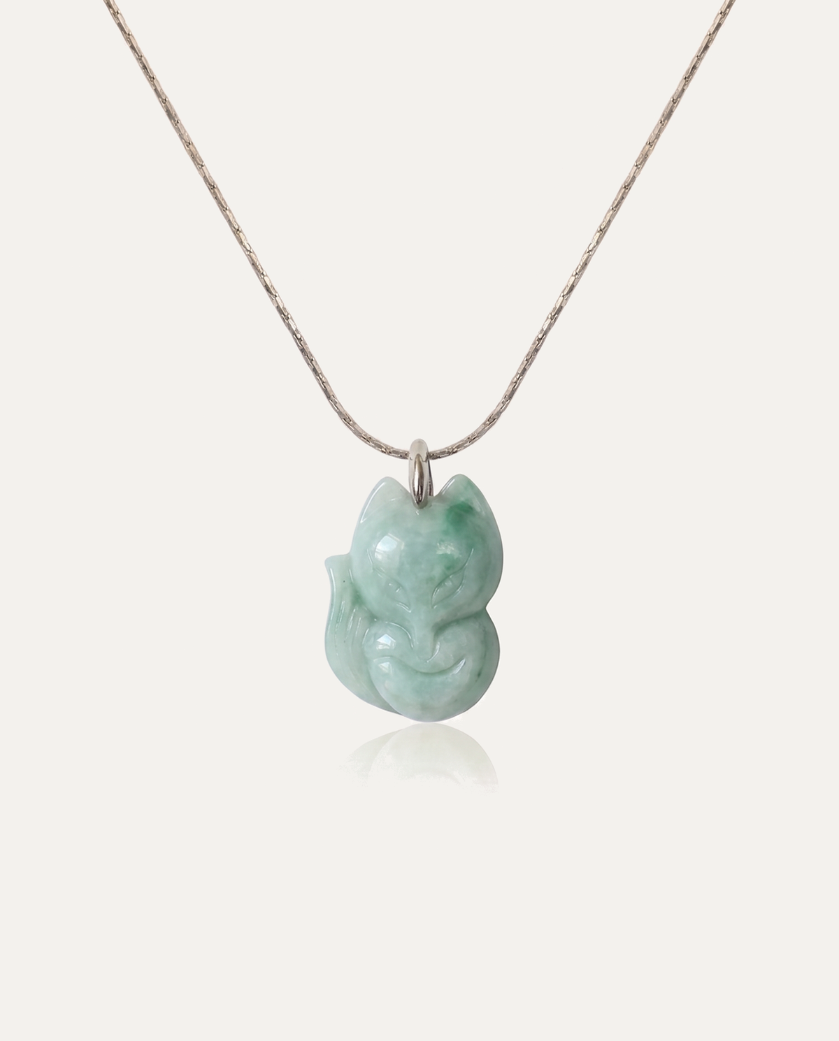 Jade fox necklace dark silver on ivory background