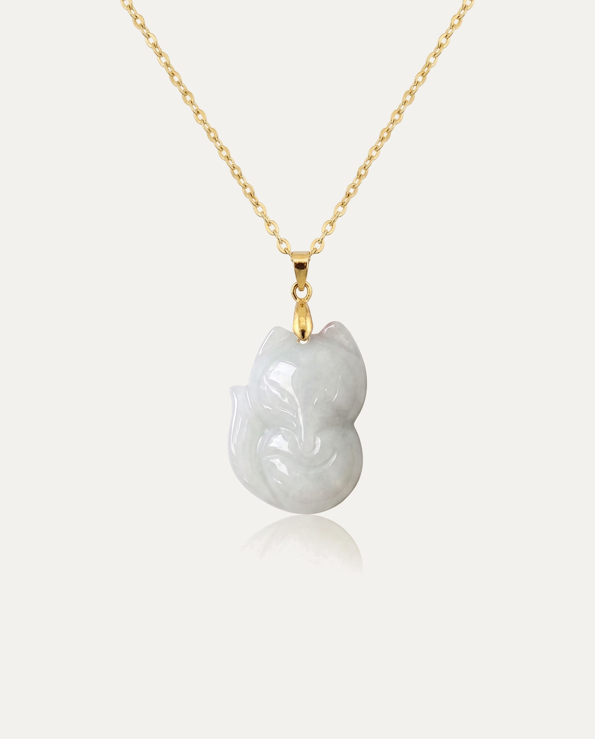 Jade fox necklace light gold on ivory background