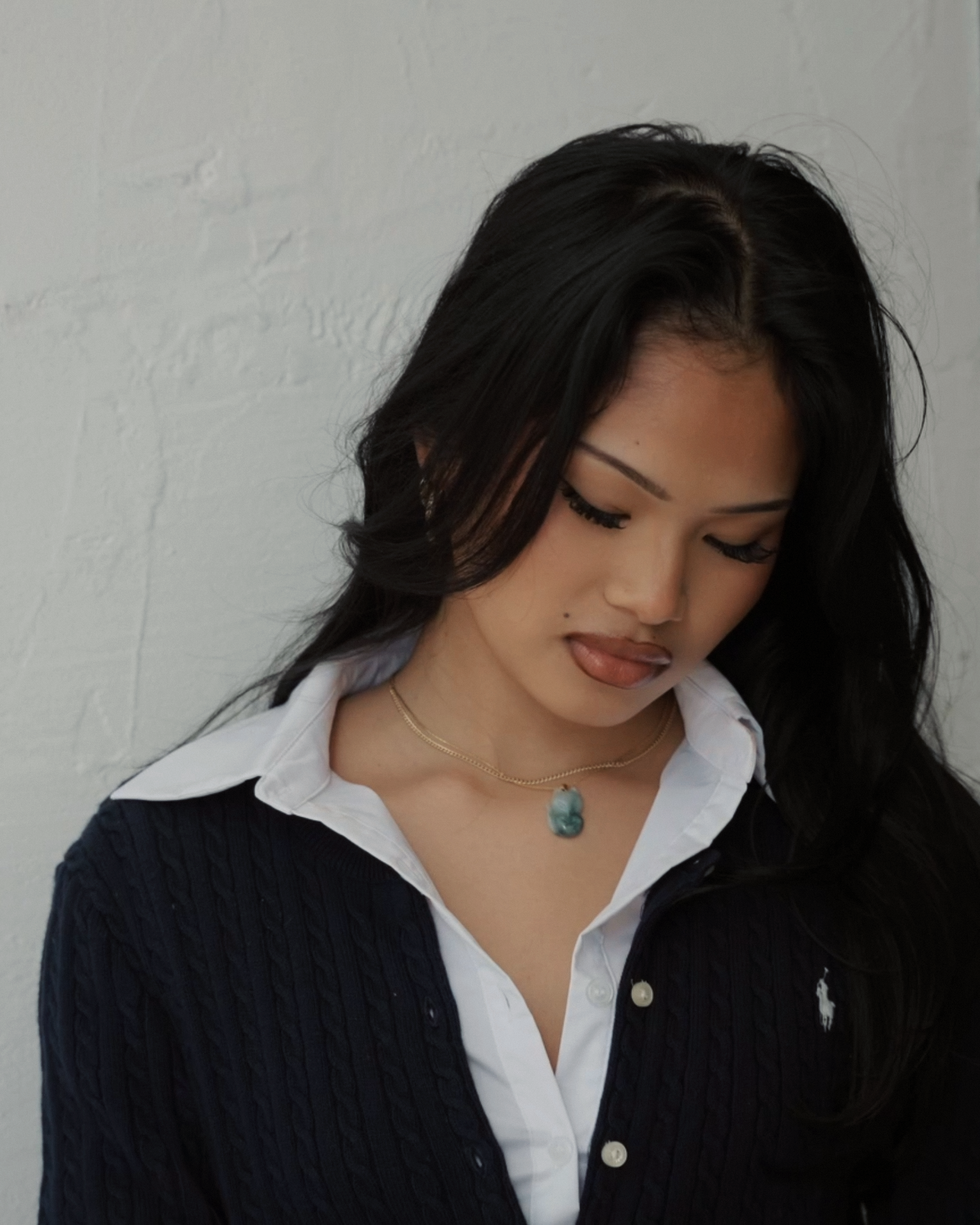 Jade fox necklace worn by model