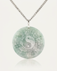 Jade Yin Yang Bagua Necklace on ivory background