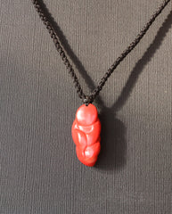 Laughing Buddha cinnabar necklace worn