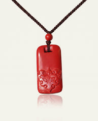 Pixiu Tag cinnabar necklace on ivory studio background
