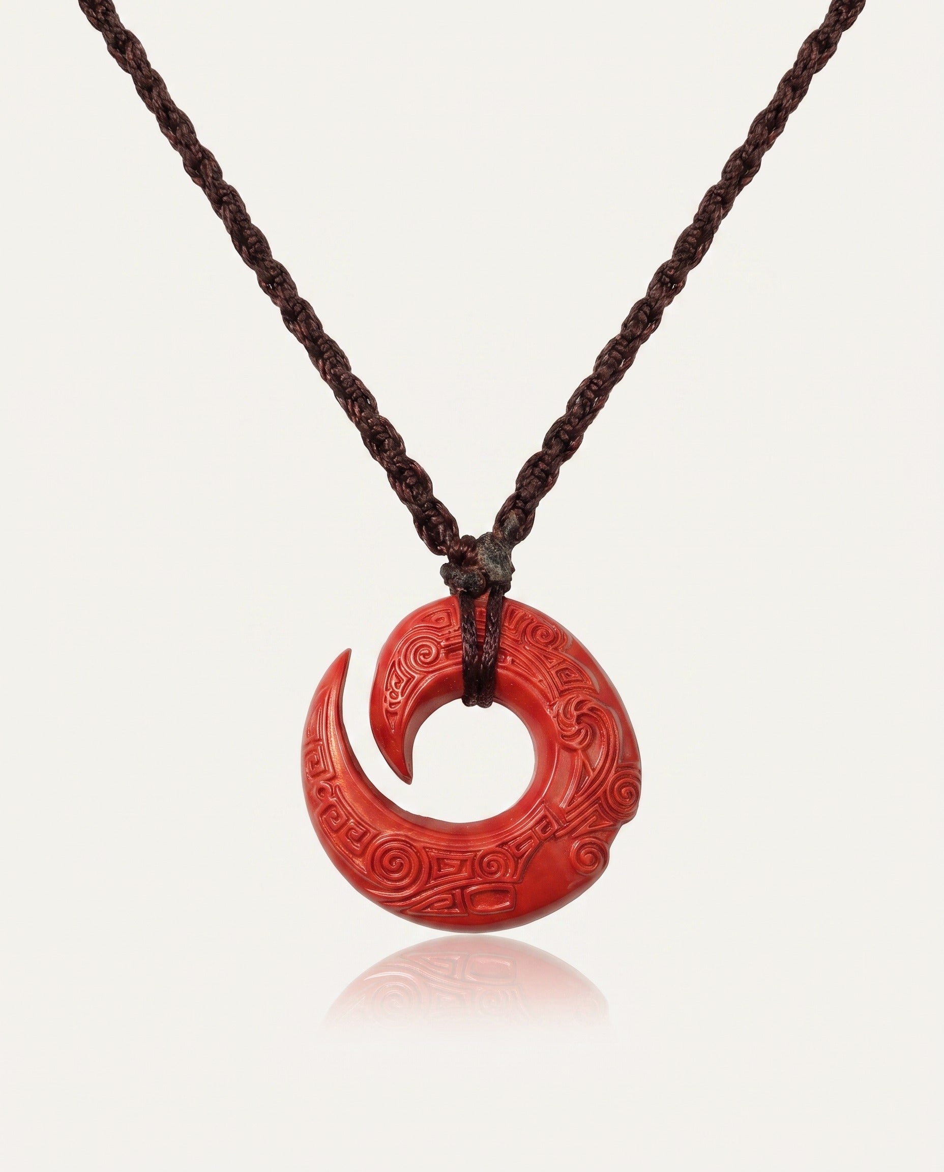 Protection Hook cinnabar necklace on ivory studio background