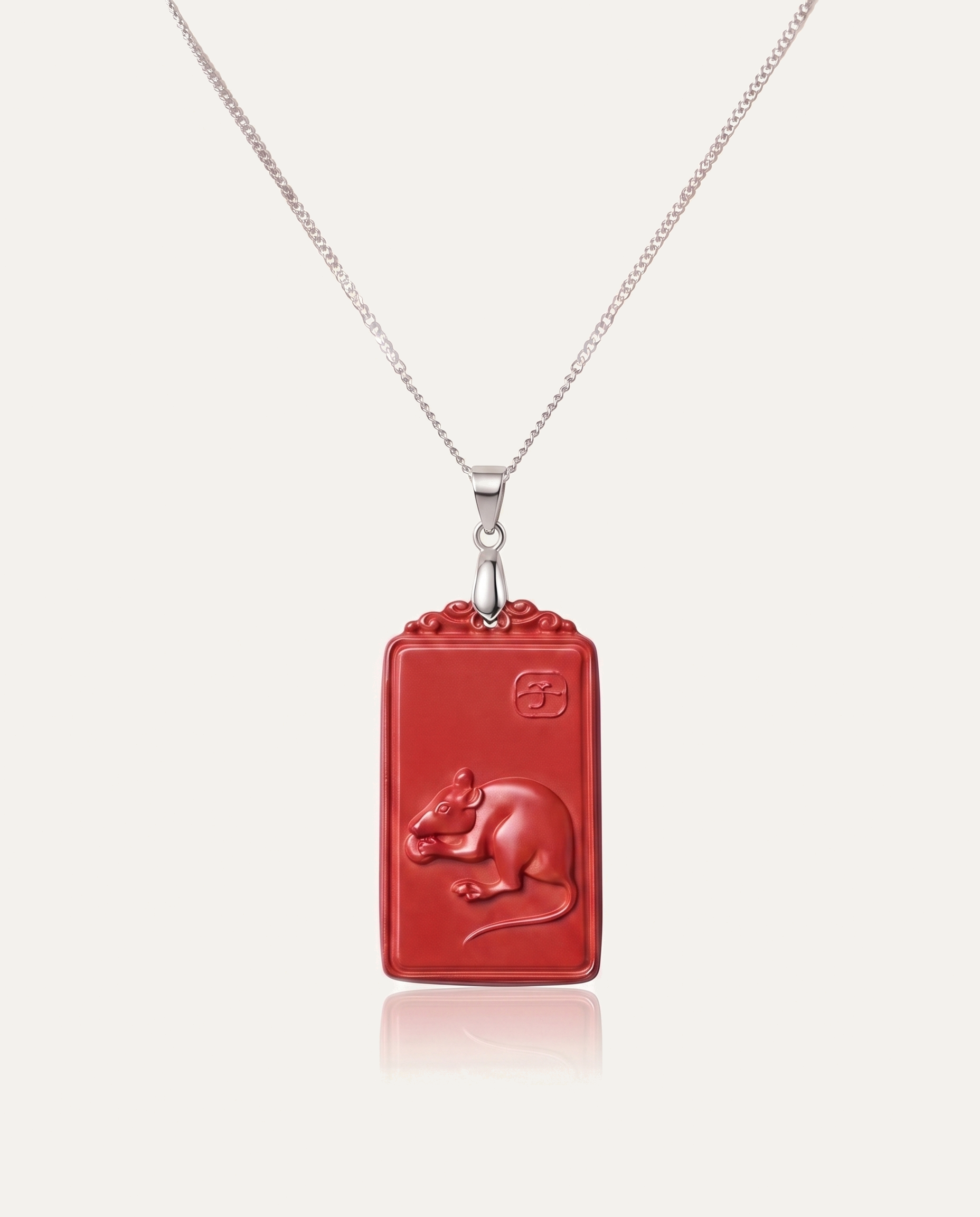 Rat zodiac cinnabar pendant necklace silver chain on ivory background