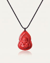 Seated Laughing Buddha cinnabar necklace on ivory studio background