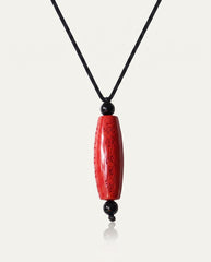 Six Character Mantra Cylinder cinnabar necklace on ivory studio background