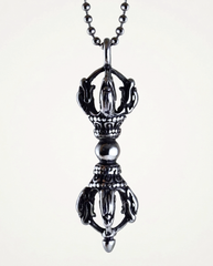 Double vajra cross pendant detail