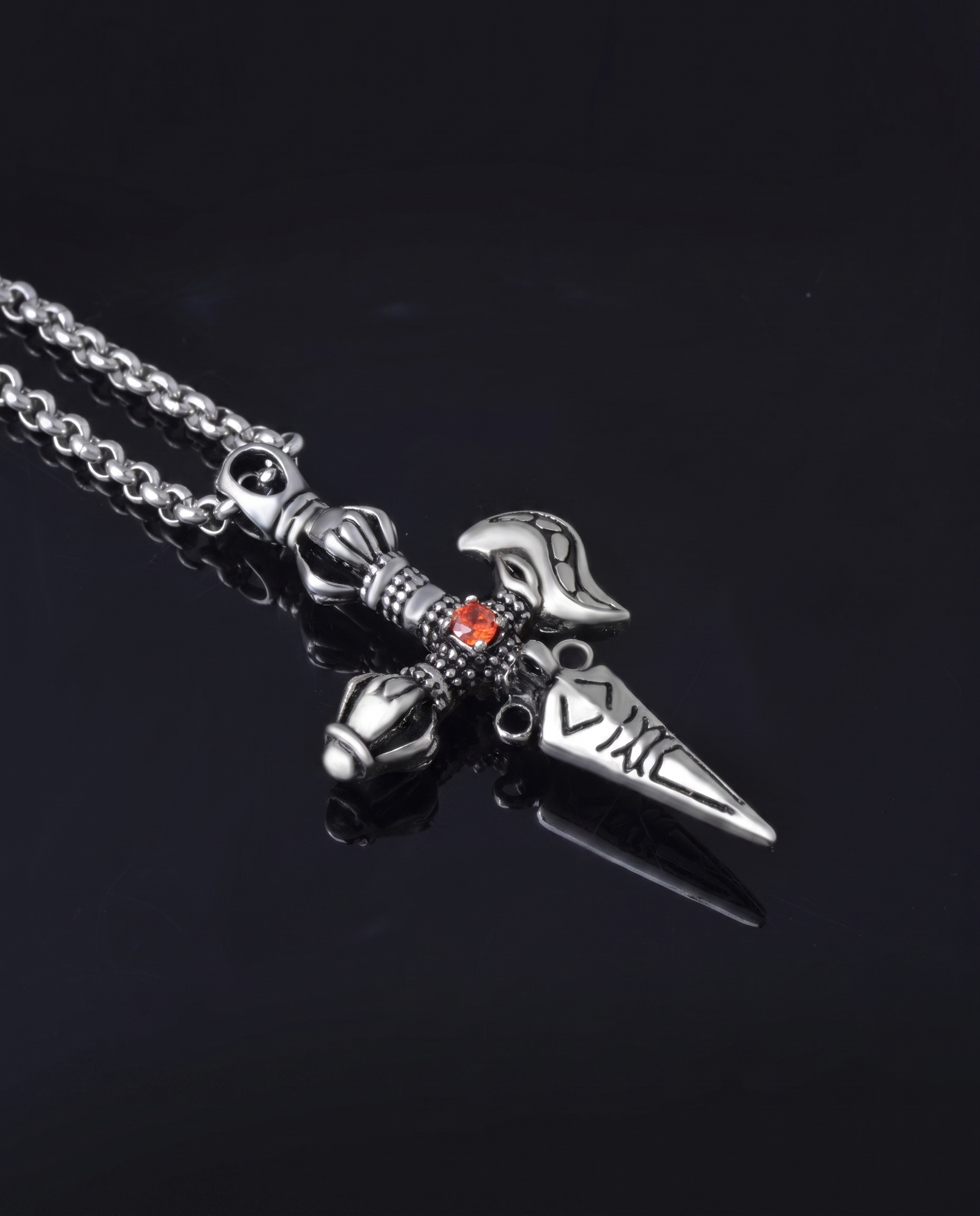 Crossed vajra dagger pendant detail
