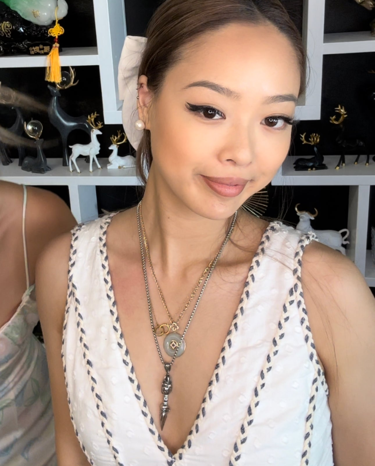 Model wearing the vajra scepter necklace
