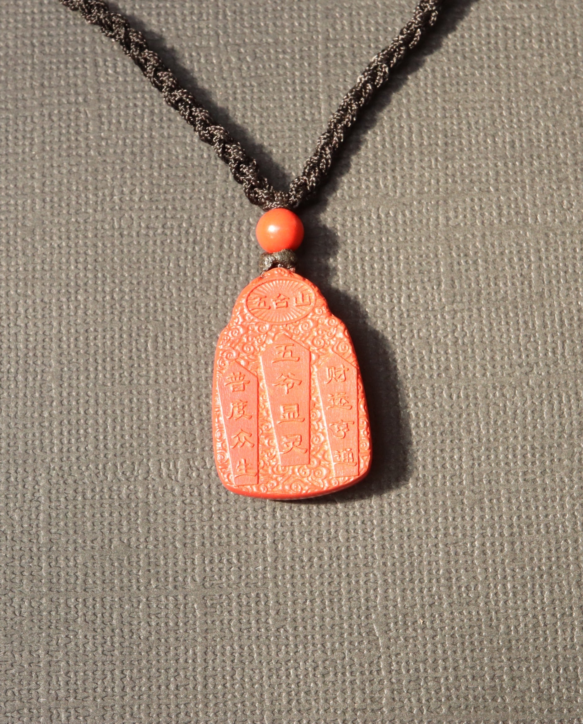 Wealth God cinnabar necklace worn