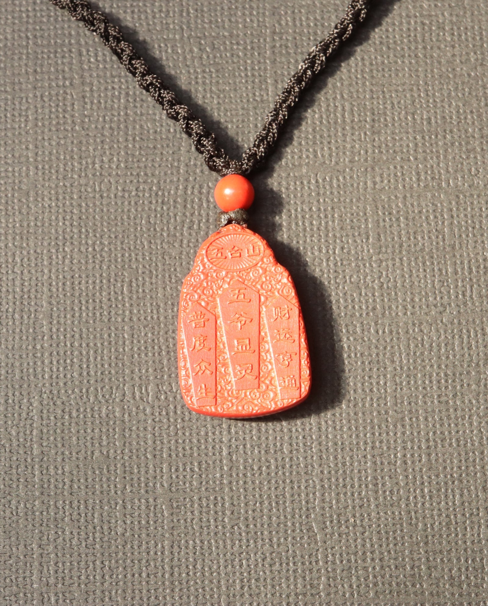 Wealth God cinnabar necklace worn