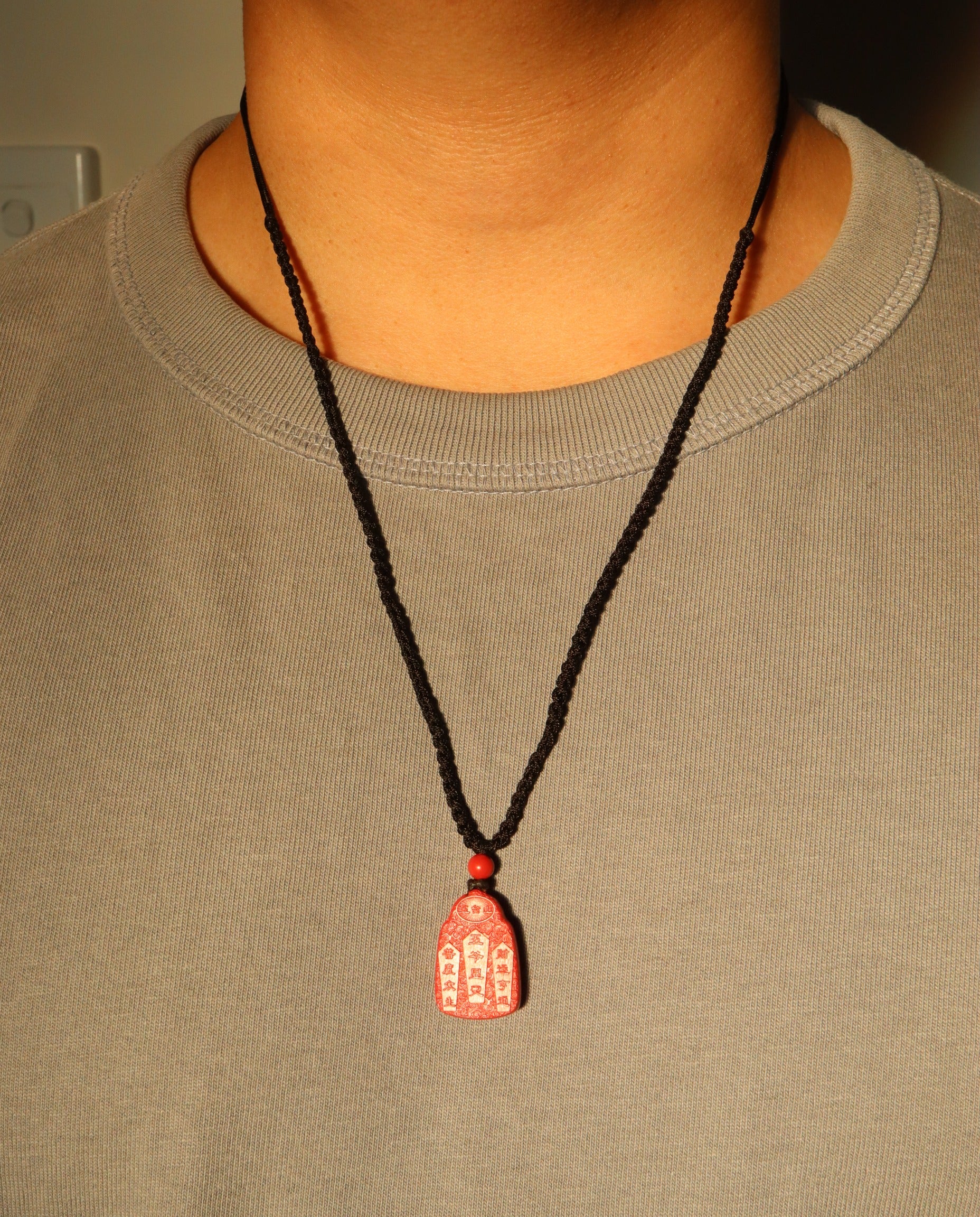 Wealth God cinnabar necklace worn