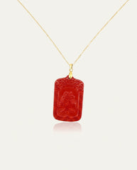 Wealth Talisman cinnabar necklace on gold chain back, ivory studio background
