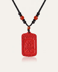 Wealth Talisman cinnabar necklace on ivory studio background